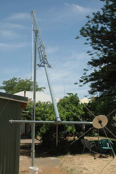Tower in the tilted over position for installation of new 5/8 wave ground plane antenna.